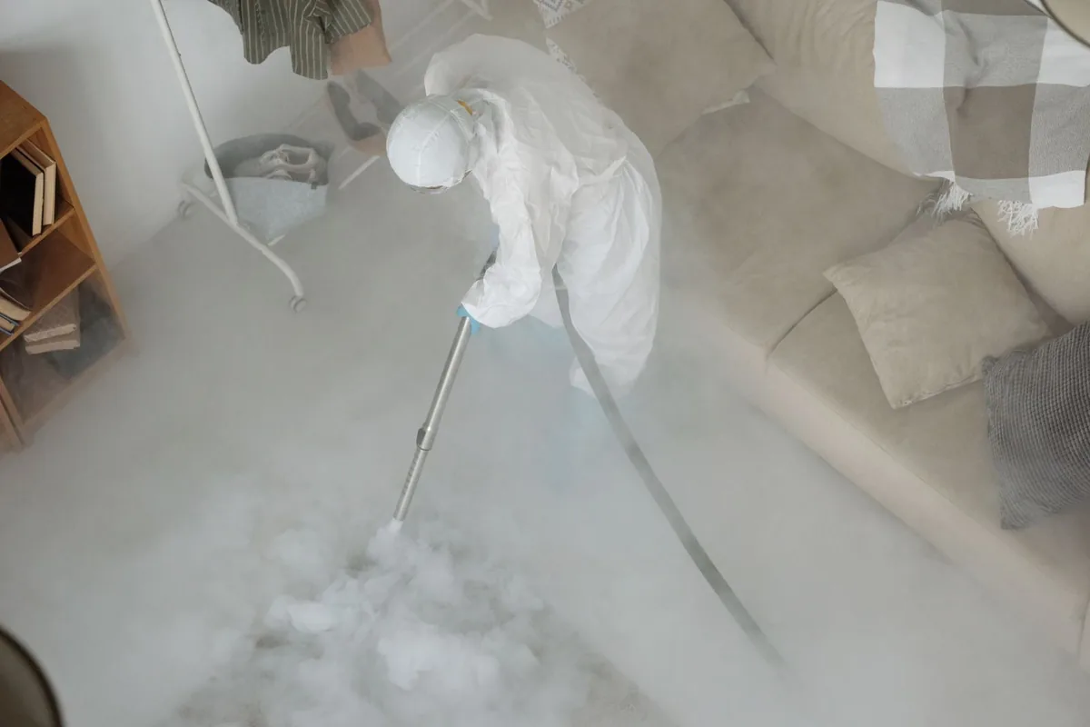 Biohazard cleanup technician in protective equipment, Morristown, TN